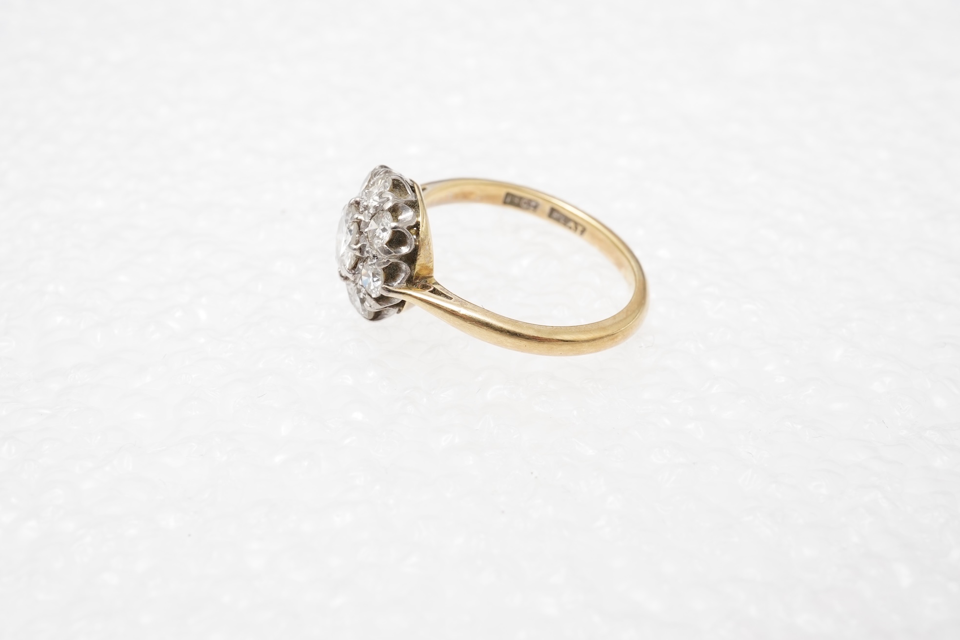 A diamond cluster ring